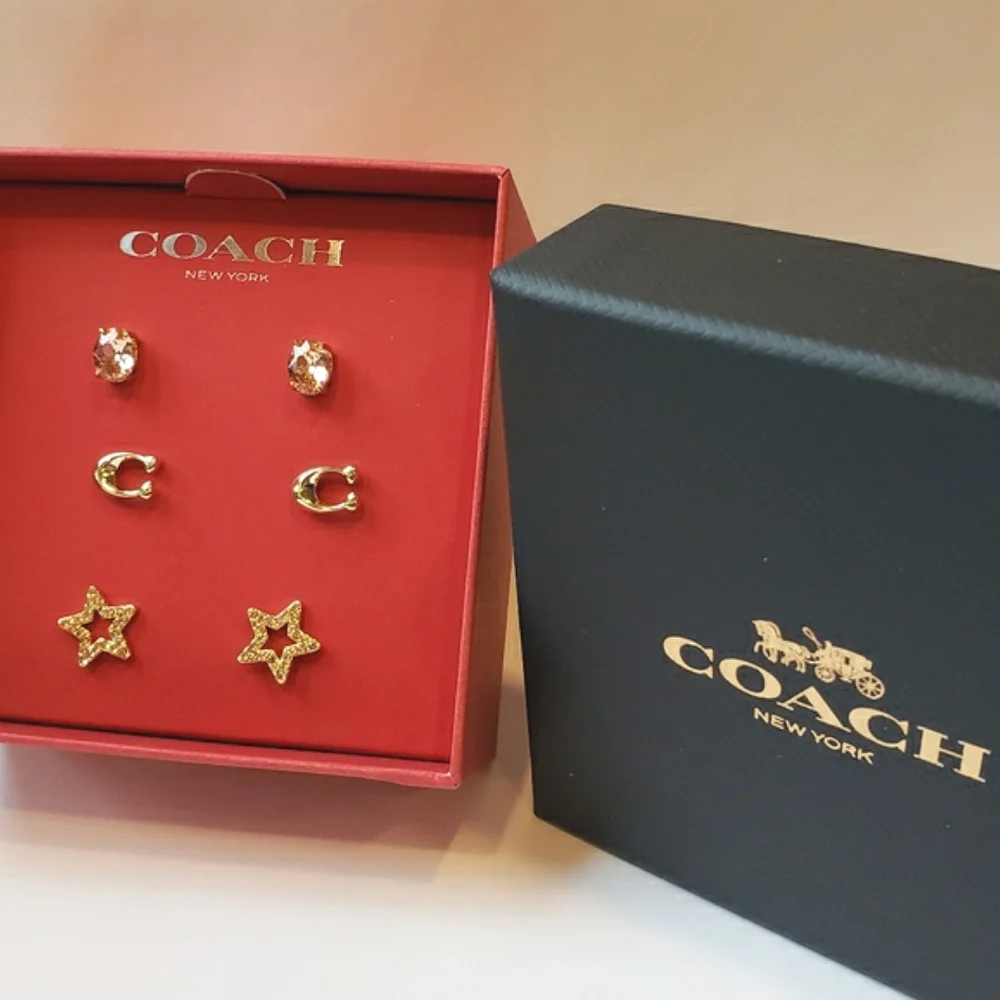 Coach Signature Star Earrings Set. 3 pairs in gift box. Pink, gold tone